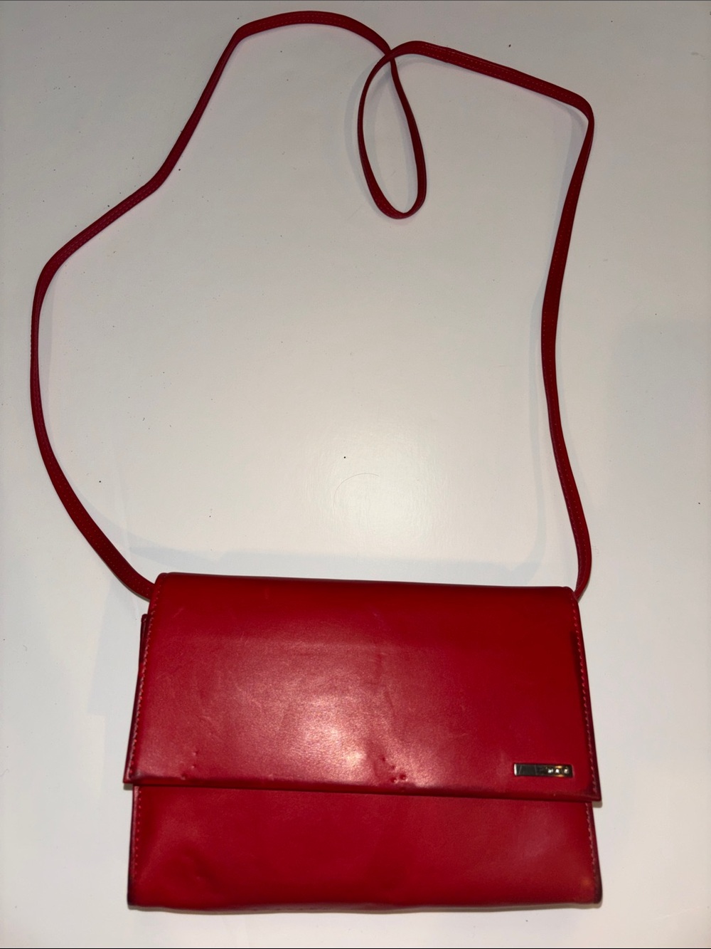 Tumi Red Leather Crossbody Bag - Sleek Minimalist Style